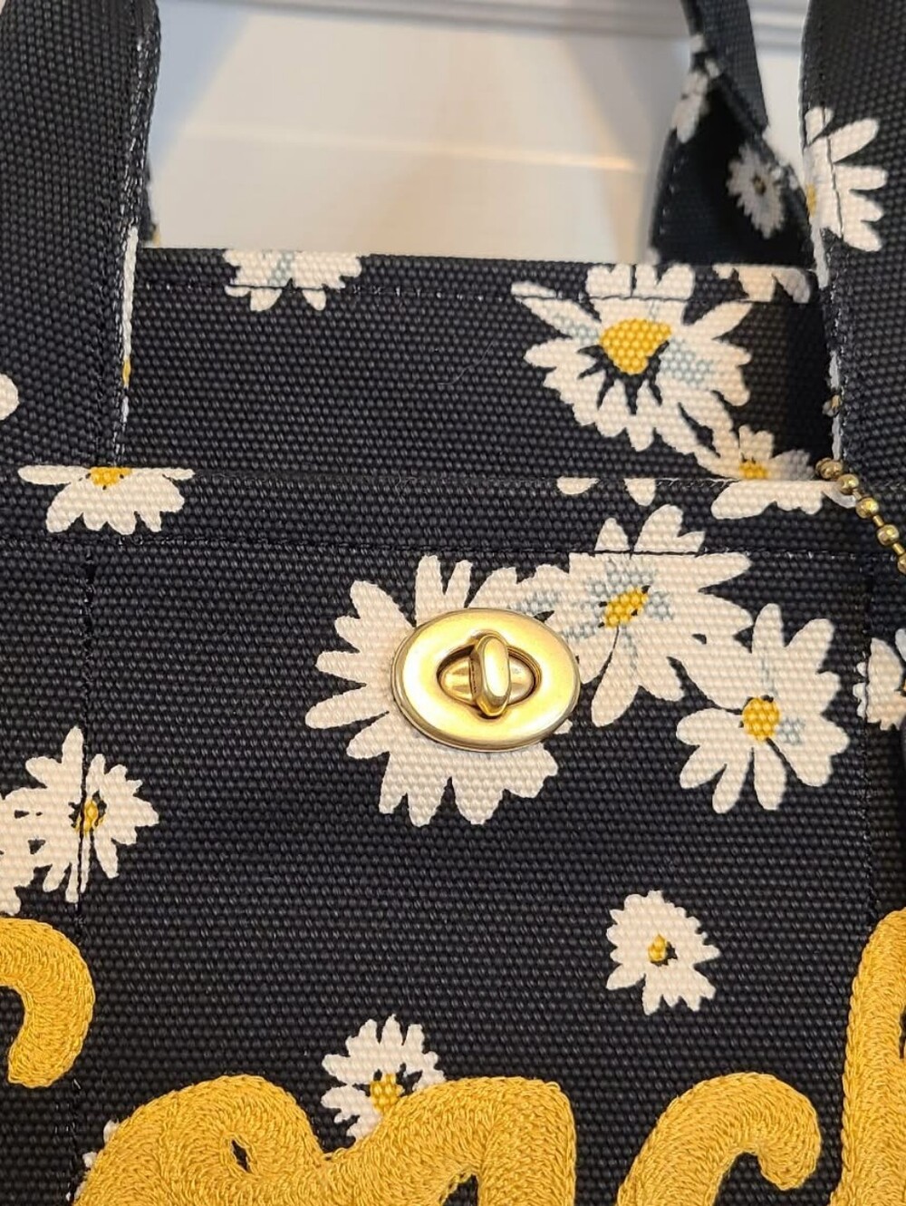 Coach Retired Daisy Canvas Tote with Yellow Coach Logo - Picture 5 of 5
